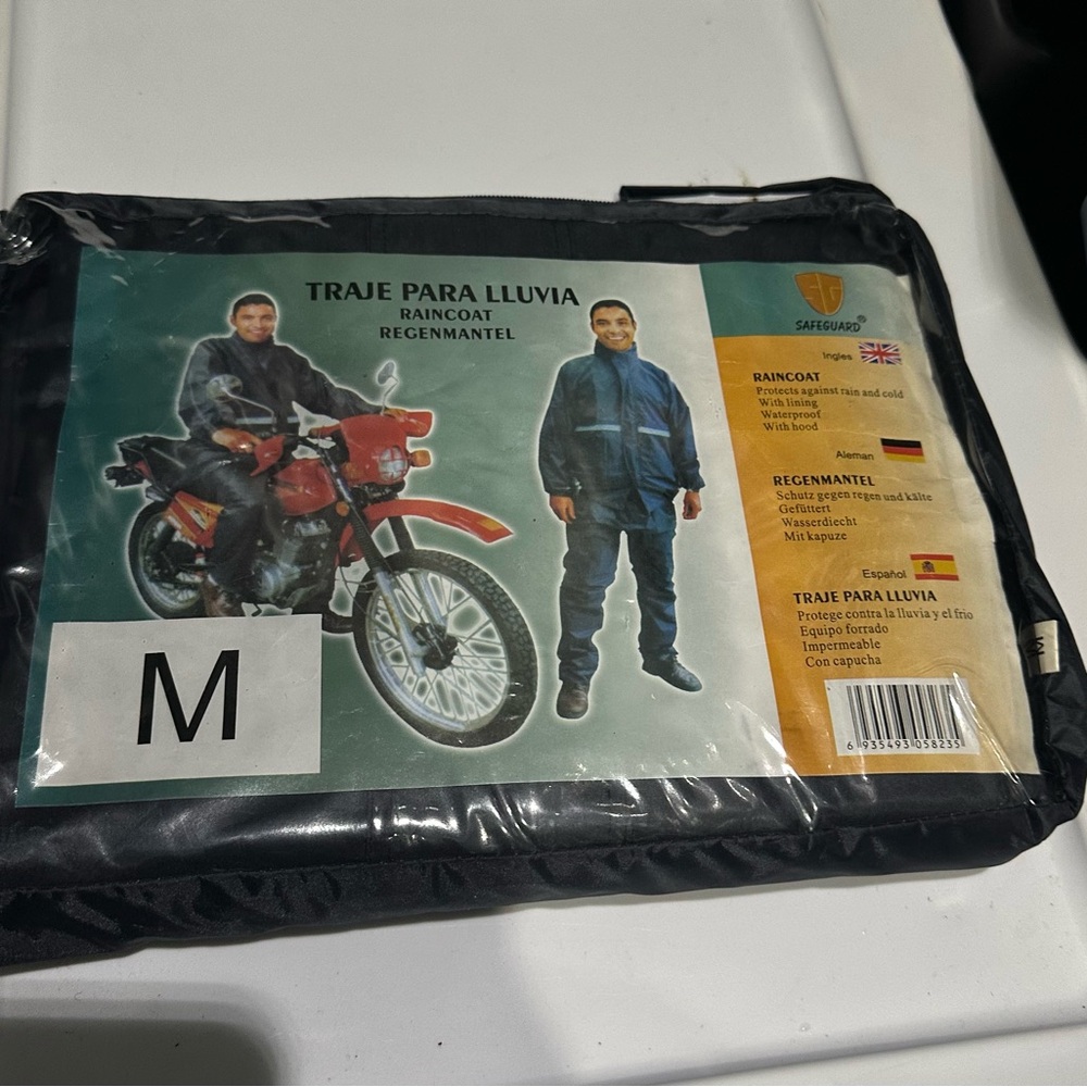 Black Raincoat with Packaging